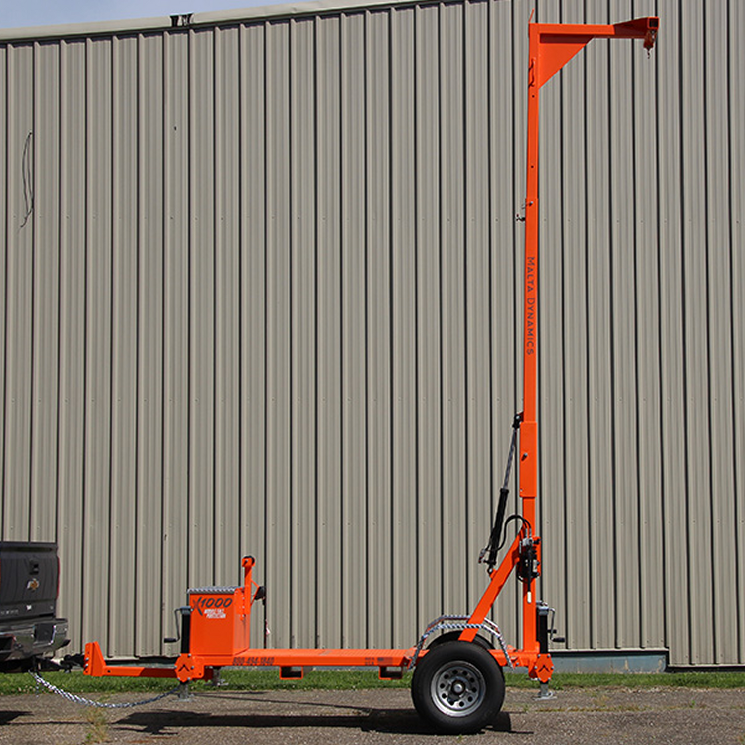 Malta Dynamics X1000 road-towable mobile fall protection grabber with overhead anchor