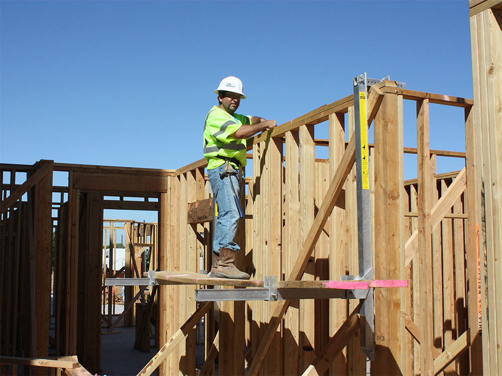 Wall Walker in use during wood frame construction